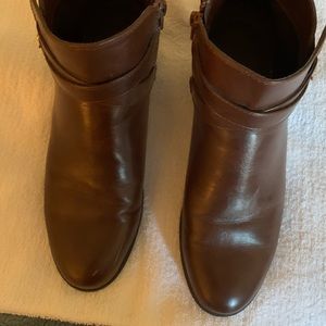 Unisa Brown Leather boots with gold features.